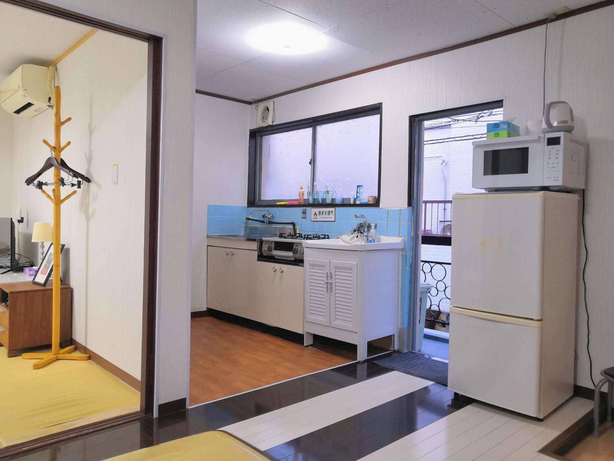 Nippori Osaka Nishi-Tengachaya Guesthouse西天下茶屋アパートメント Екстериор снимка