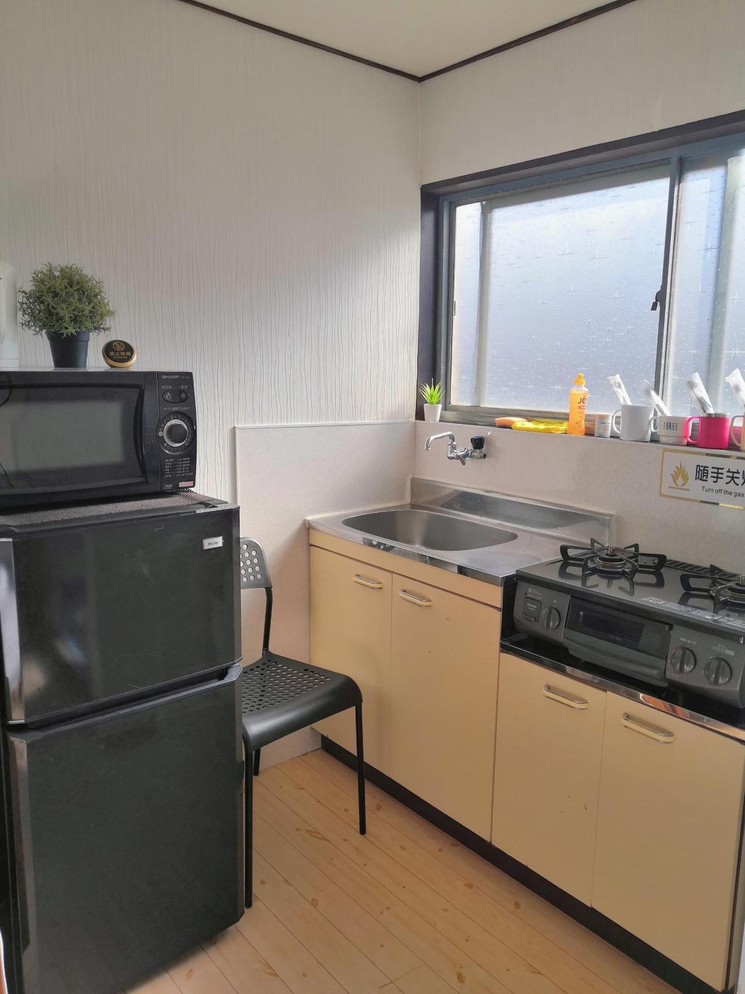 Nippori Osaka Nishi-Tengachaya Guesthouse西天下茶屋アパートメント Екстериор снимка
